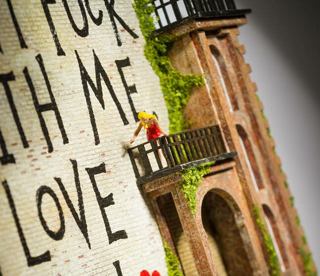 Close up of Nic Joly s  Honest Love  artwork showing a Romeo and Juliet inspired balcony scene with miniature figures 